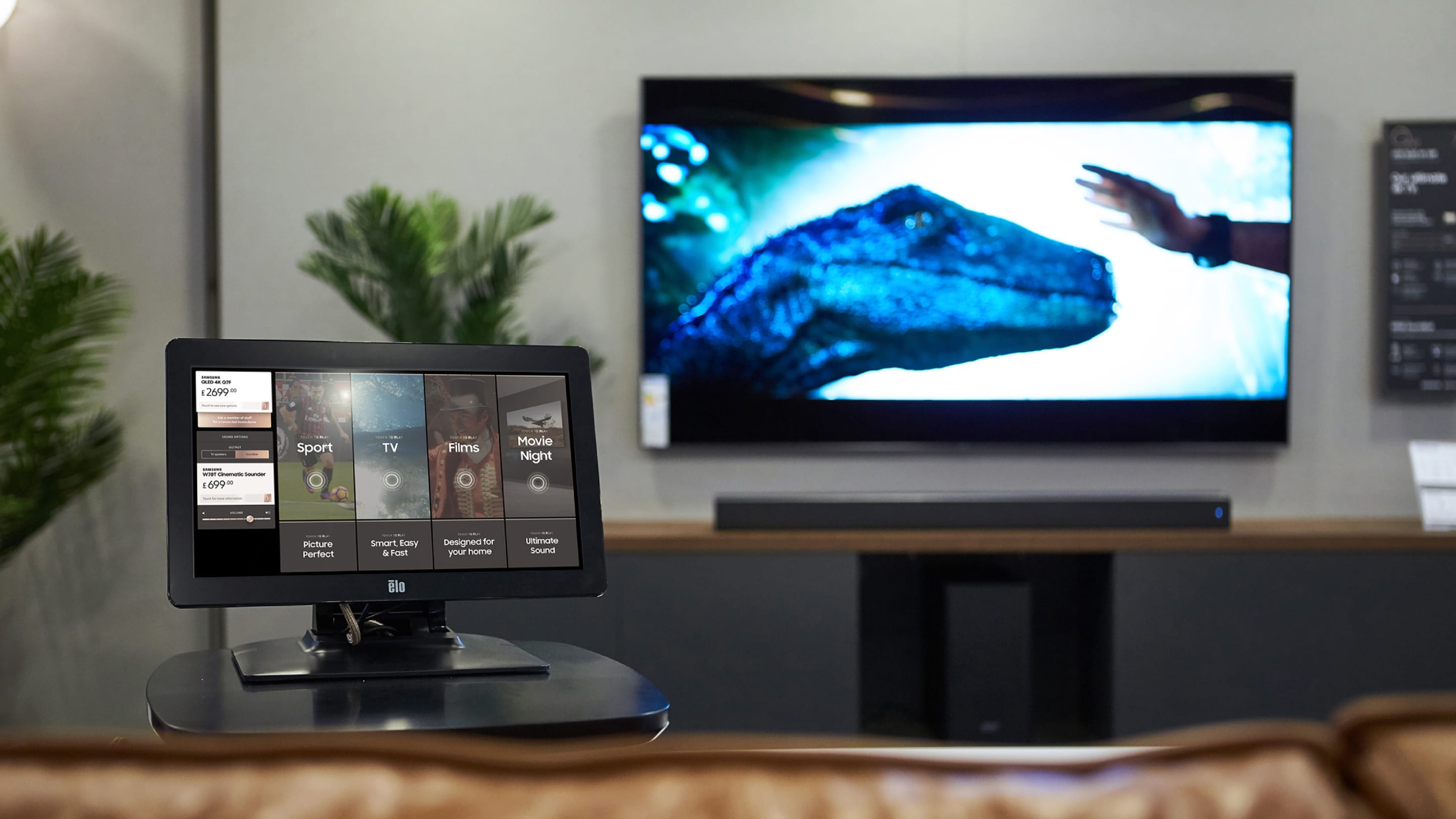 Digital point of sale display screen in Harrod's London, providing product discovery for Samsung TVs