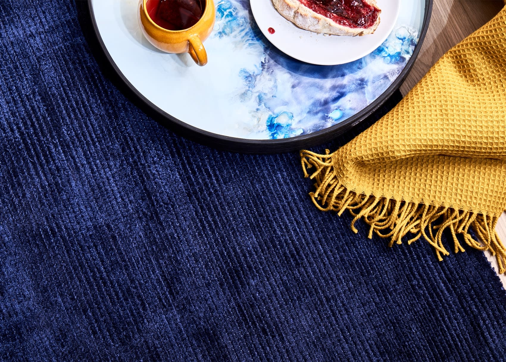 Blue and mustard fabric throw
