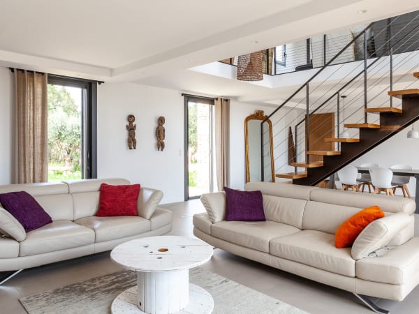 The bright, generously proportioned, open-concept living and dining area.