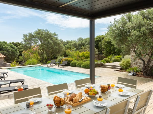 The dining area next to the pool.