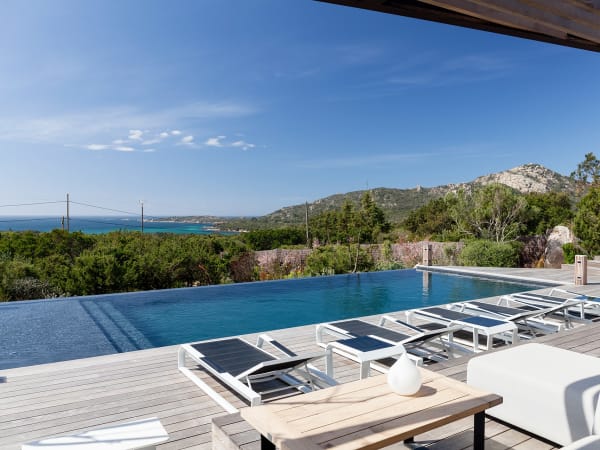 The decked terracing, the infinity pool and the sea views.
