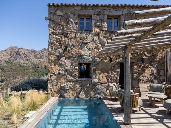 Casonu's gorgeous pool terrace with the stone-flagged house rising above.