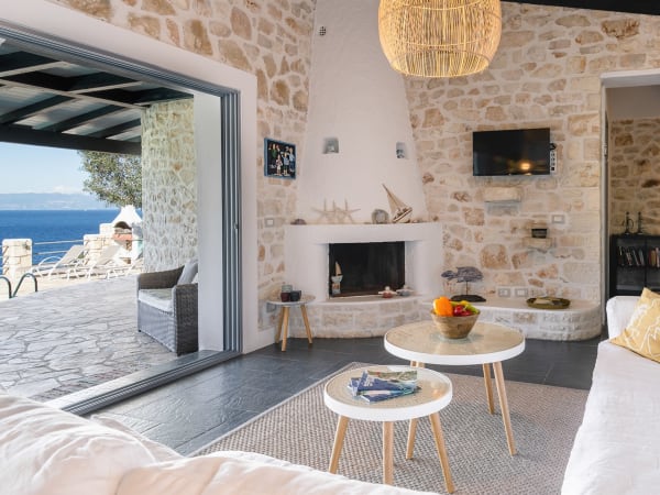 The airy, bright living area. Please note the fireplace is not for guests' use.