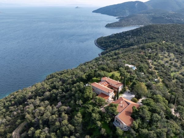 Villa Aetos rising in its private 60-acre coastal estate.