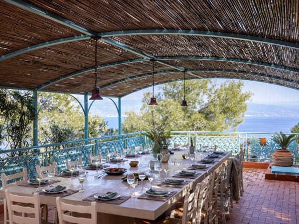 Villa Aetos's splendid al fresco dining area with its views out to sea.