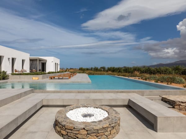 The firepit at one end of the pool.