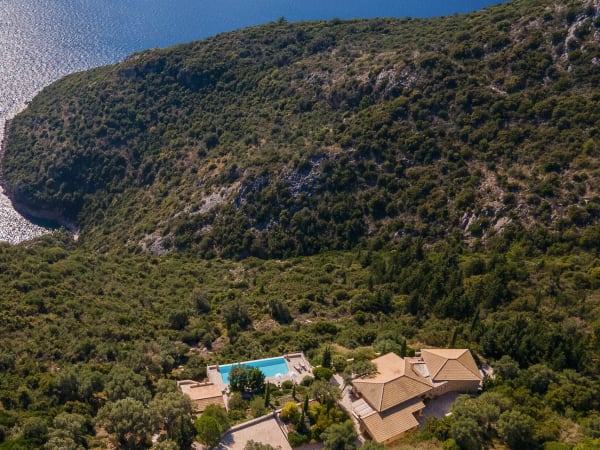 Cape Lougi sublime location amongst the greenery of Lefkada's east coast cliffs.