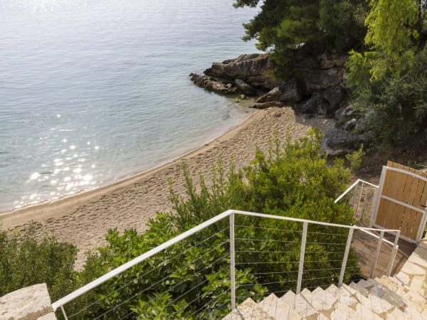 The magic gate, which opens onto the sandy beach below Eolia.