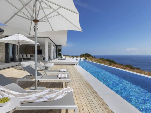 Choose your spot by the main pool for some well-deserved relaxation.