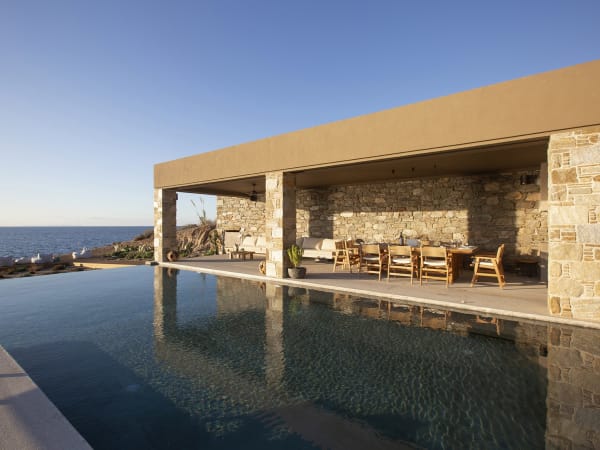 The gorgeous pool has a shallow section with hydromassage jets.