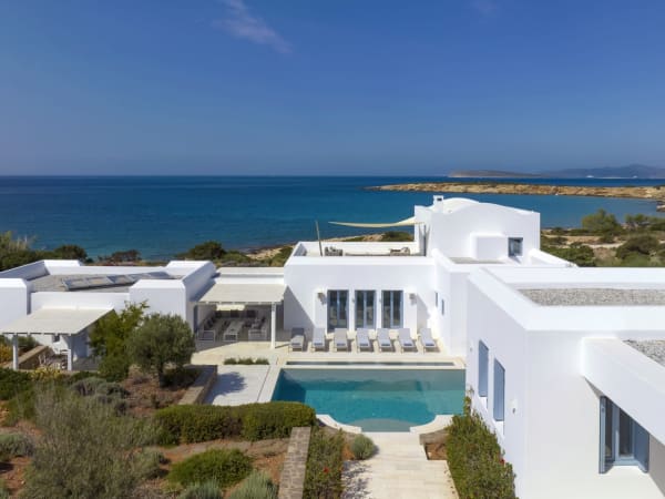 Accommodation at Iro wraps around internal terraces and looks out to sea.