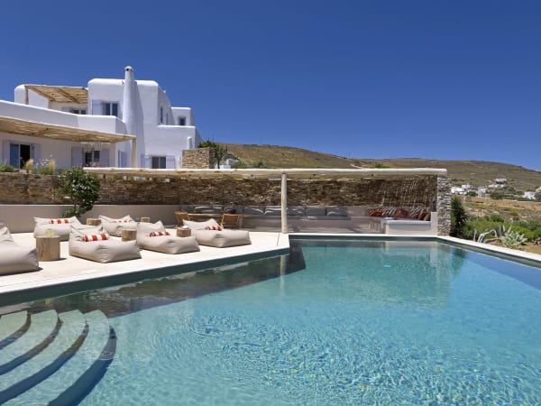 A serene atmosphere by Kairos's pool.