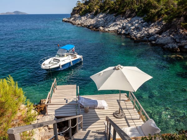 The private jetty and sea access below Kolokithi Bay.