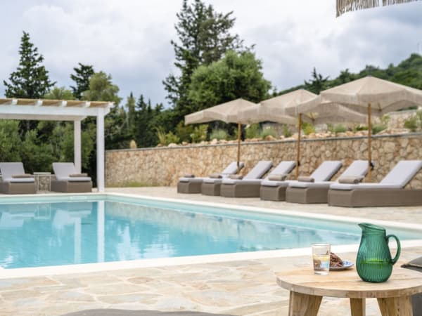 Relaxing down by Louisa's 14m-long pool.