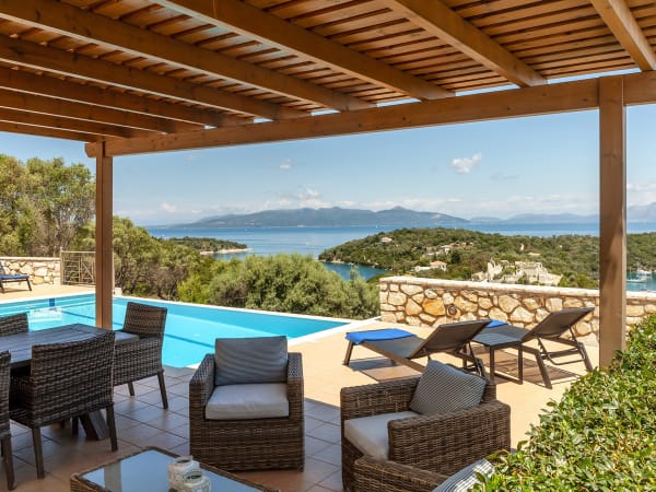 The comfortable shaded area by the pool.
