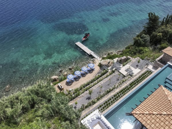 Michaela's stunning location, its pool and its sea access seen from above.