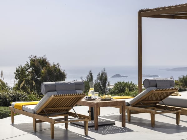 Gazing out at the views from the terrace above the pool.