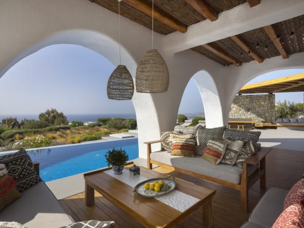 The shaded portico outside the main house's open-concept communal area.