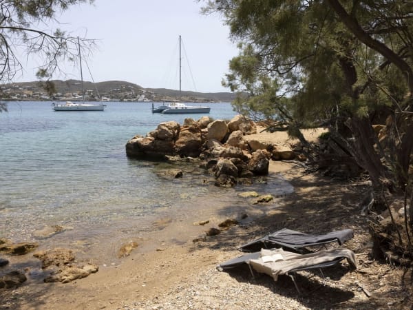 Two gates at the bottom of the tiered gardens open out onto this divine little bay.