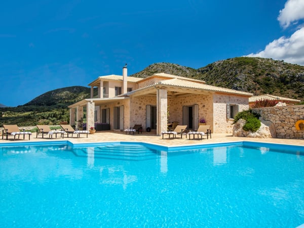 The inviting pool with the handsome villa in the background.