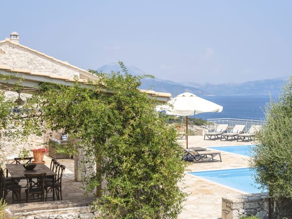 The shady al fresco dining area, the pool and the views.