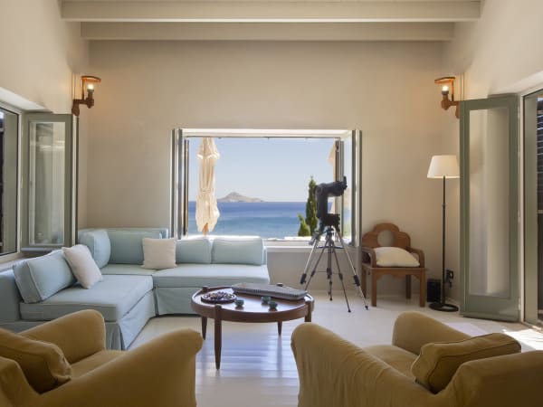 The beautifully appointed open-plan living and dining area with its views out to sea.