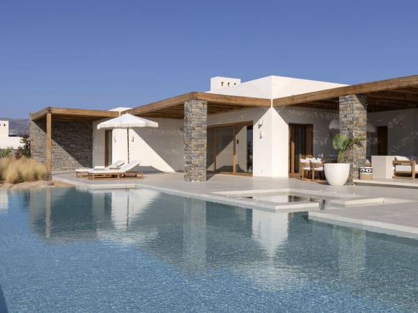 Villa II and its dreamy terrace seen from the infinity edge of the pool.