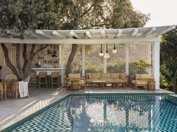The shady sitting area and poolside bar.