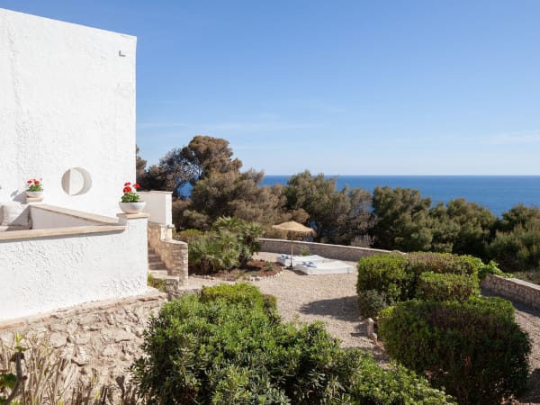 Multiple terraces and flourishing gardens offer plenty of space for guests.