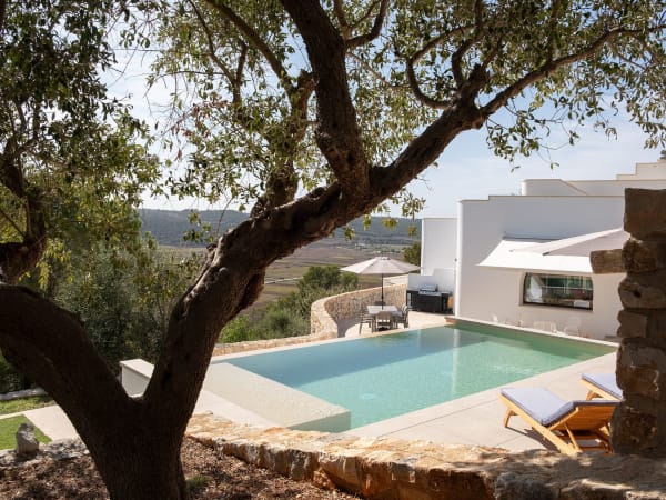 Villa Kamares's infinity pool, with its shallow, beach-effect shelf.