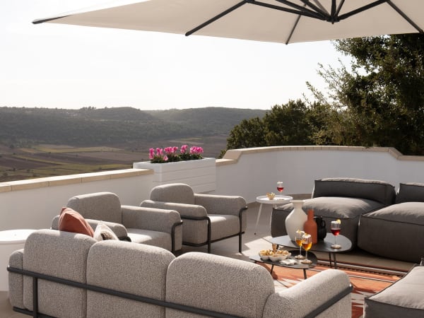 The main al fresco living area boasts superb views out over the surrounding countryside.