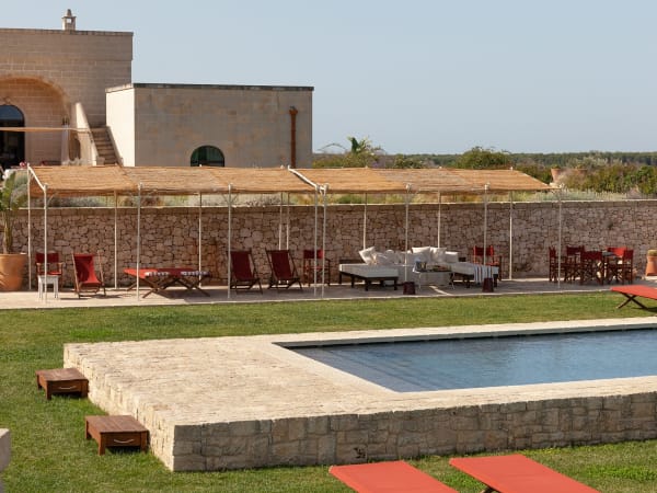 The pool area has plenty of shady and sun-kissed spots to choose from.