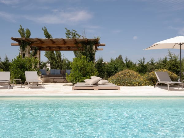 The shady al fresco sitting area by the pool.