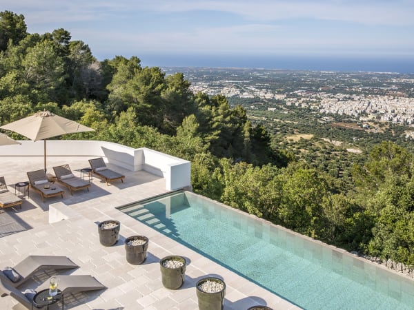 Olive groves, Fasano and the blue Adriatic Sea seen from the pool area.