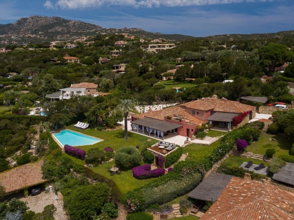 I Corbezzoli rising amidst its flourishing, luxuriant gardens.