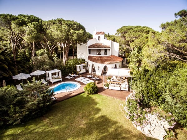 Maria rising amidst its luxuriant gardens.