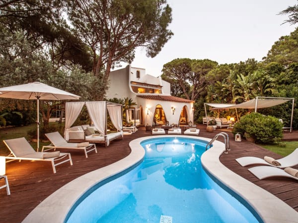 Maria's tempting figure-of-eight pool, surrounded by decking and sun loungers.