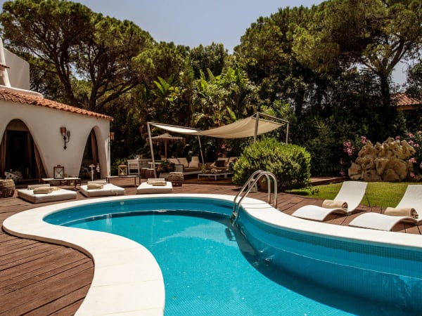 Maria's al fresco areas are secluded by mature trees.