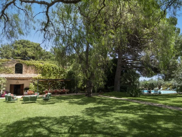 The gorgeous, luxuriant gardens of Balu, with the house to the left and the pool just visible to the right.
