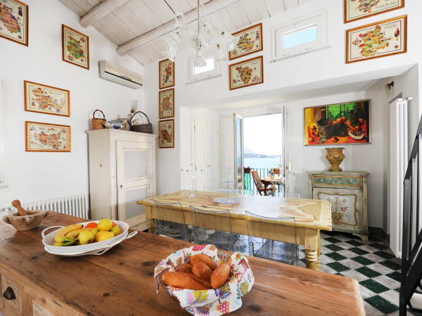 The lovely kitchen diner with its access on to the sea-view terrace.