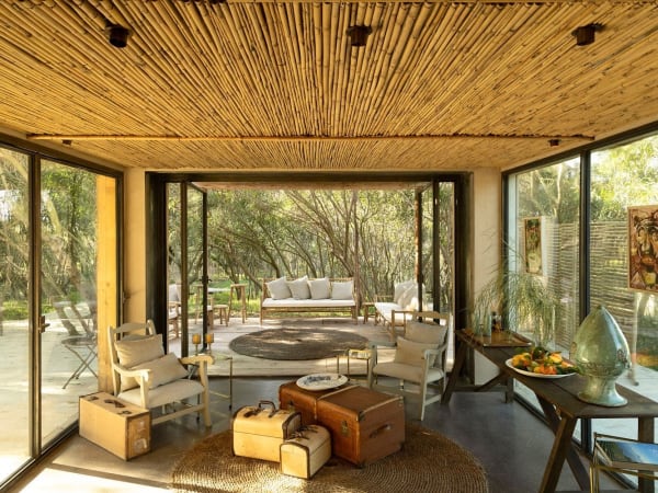 The open-plan social area with its walls of glass doors.