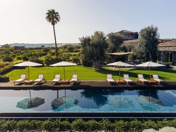 Chiusaliva, its pool and its mature, beautifully maintained gardens.