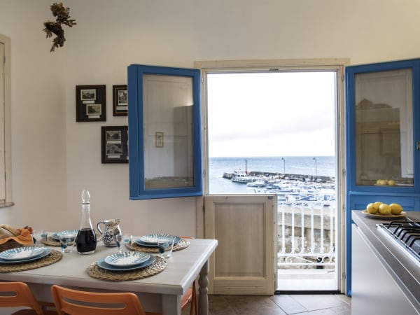 The kitchen-diner with its sea and harbour views.