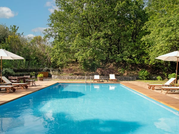 The pool is surrounded by the wonderful gardens.