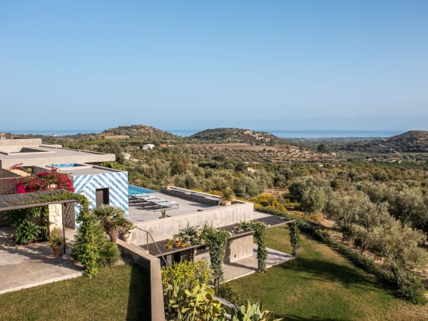 Views across the gardens and the rolling hills of the Val di Noto.