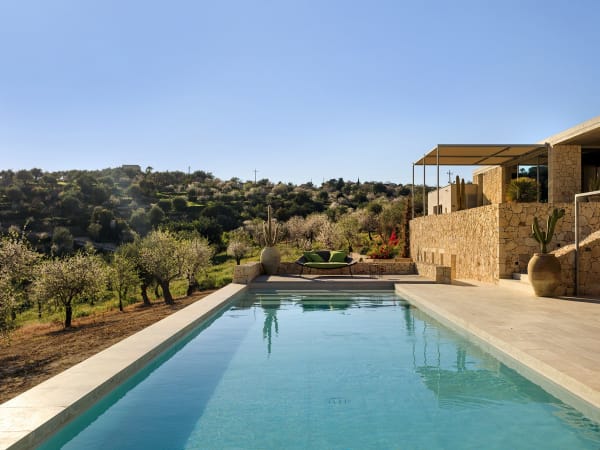The pool with the main house above.