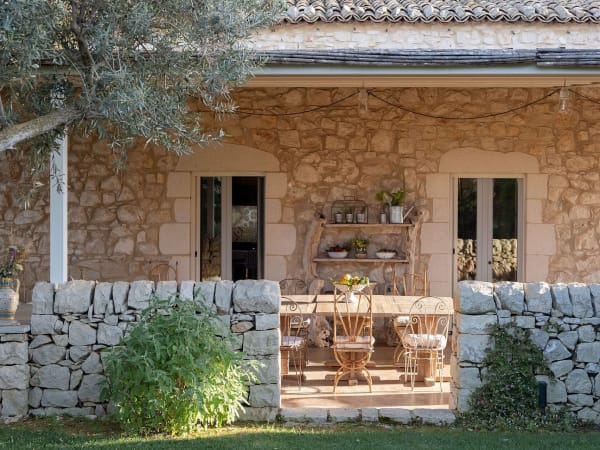 Heading towards the the secluded al fresco dining and living area, which is served by an outdoor kitchen.