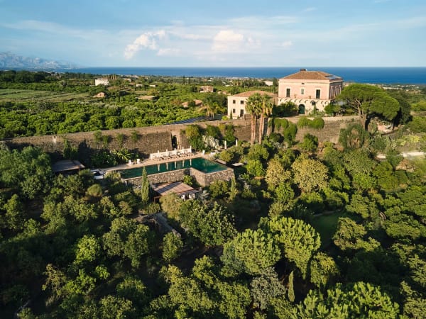 Rocca delle Tre Contrade rising handsomely on its hill above the Ionian Sea.