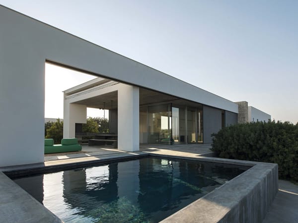 TerraMia's inviting plunge pool framed by the property's geometric forms.