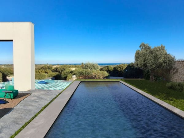 The graceful pool looking out to sea (an architect's rendering).